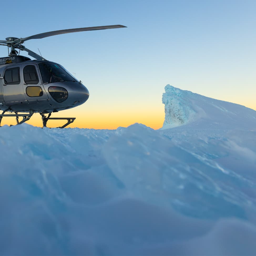 Person taking picture in a helicopter
