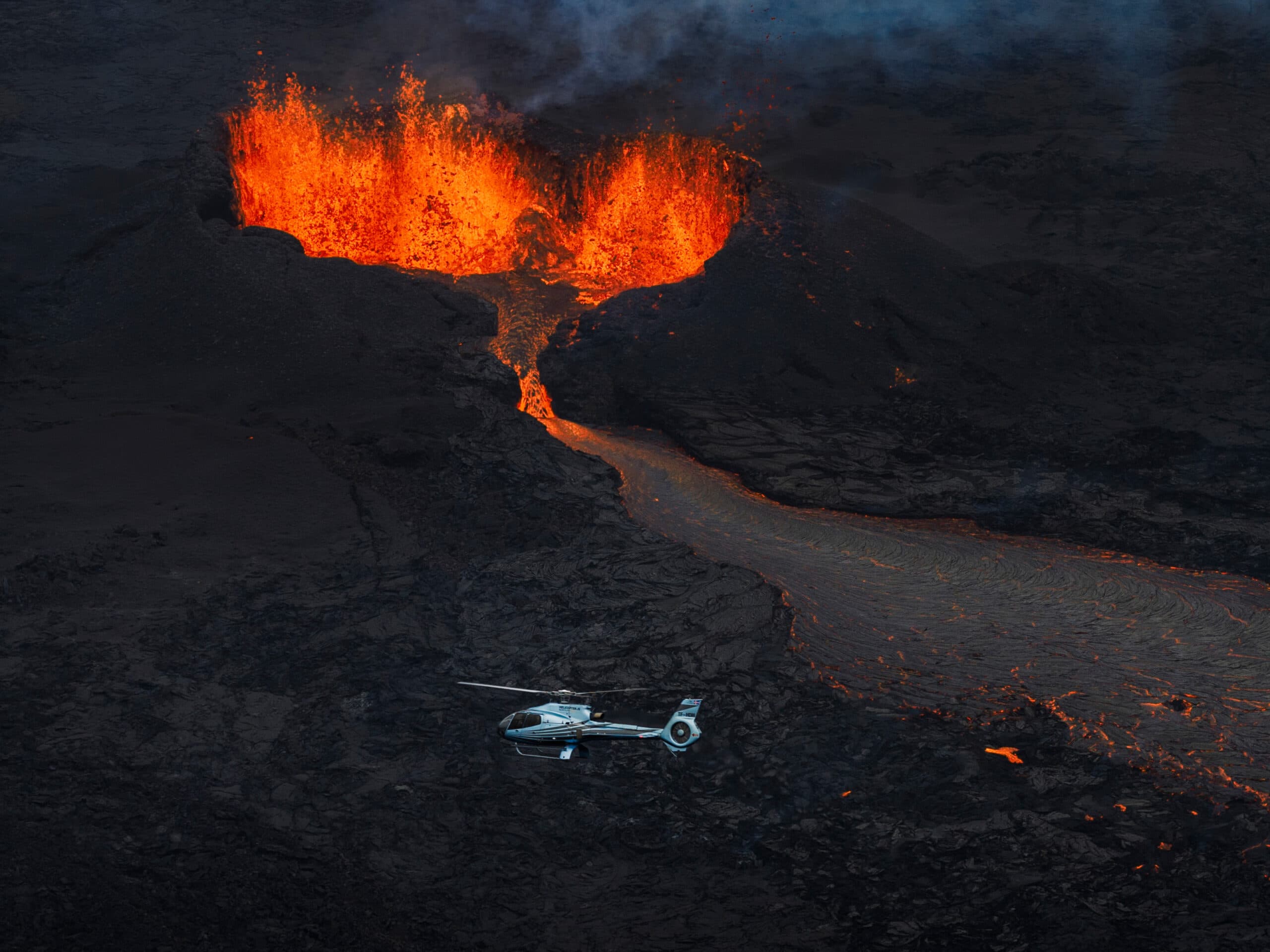 Person taking picture in a helicopter