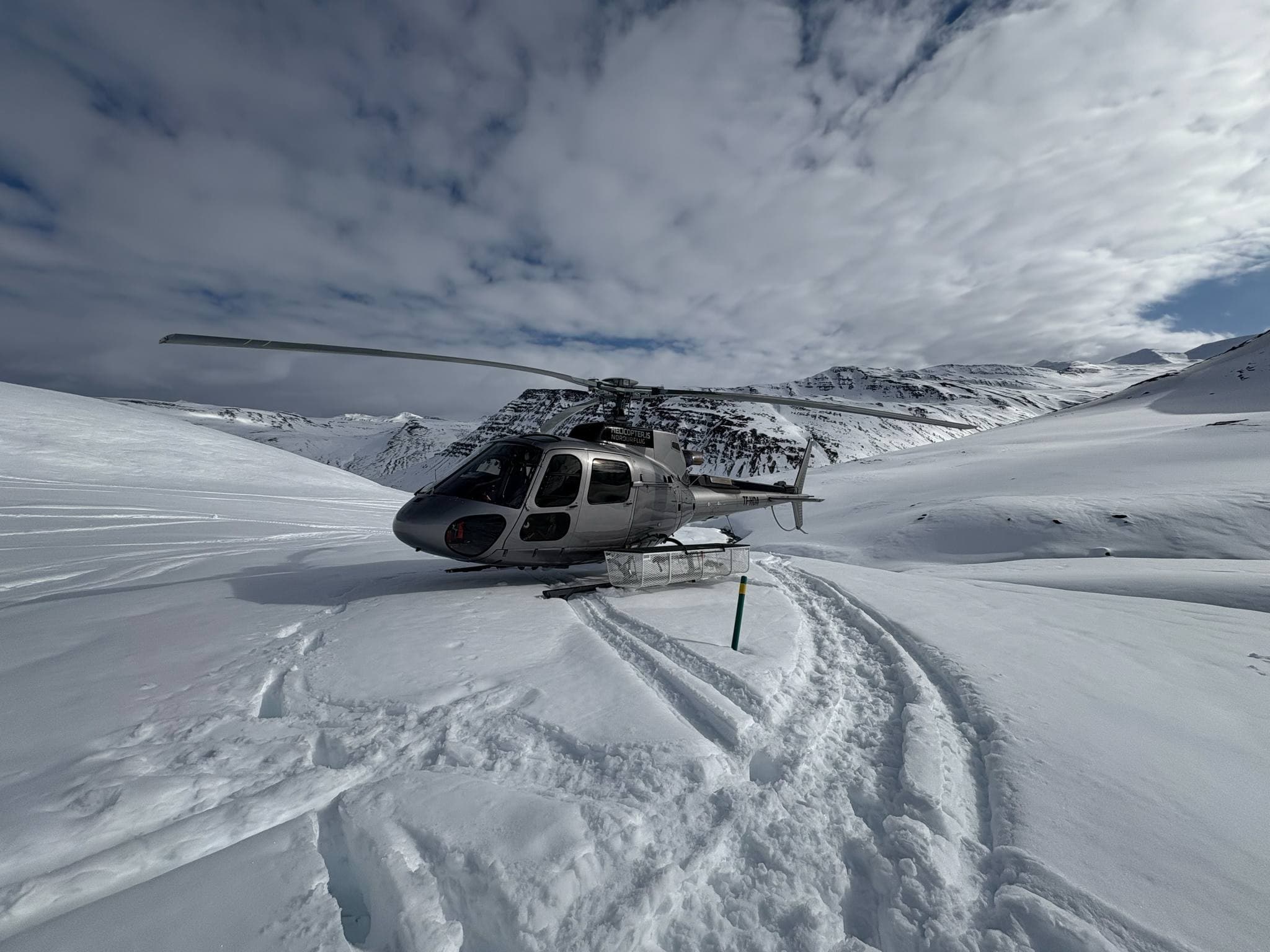 Person taking picture in a helicopter