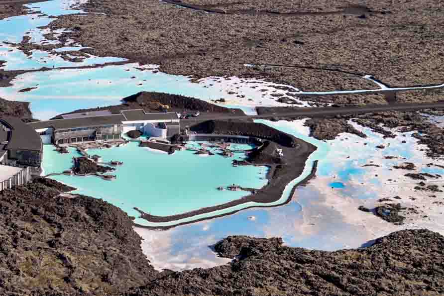 Person taking picture in a helicopter